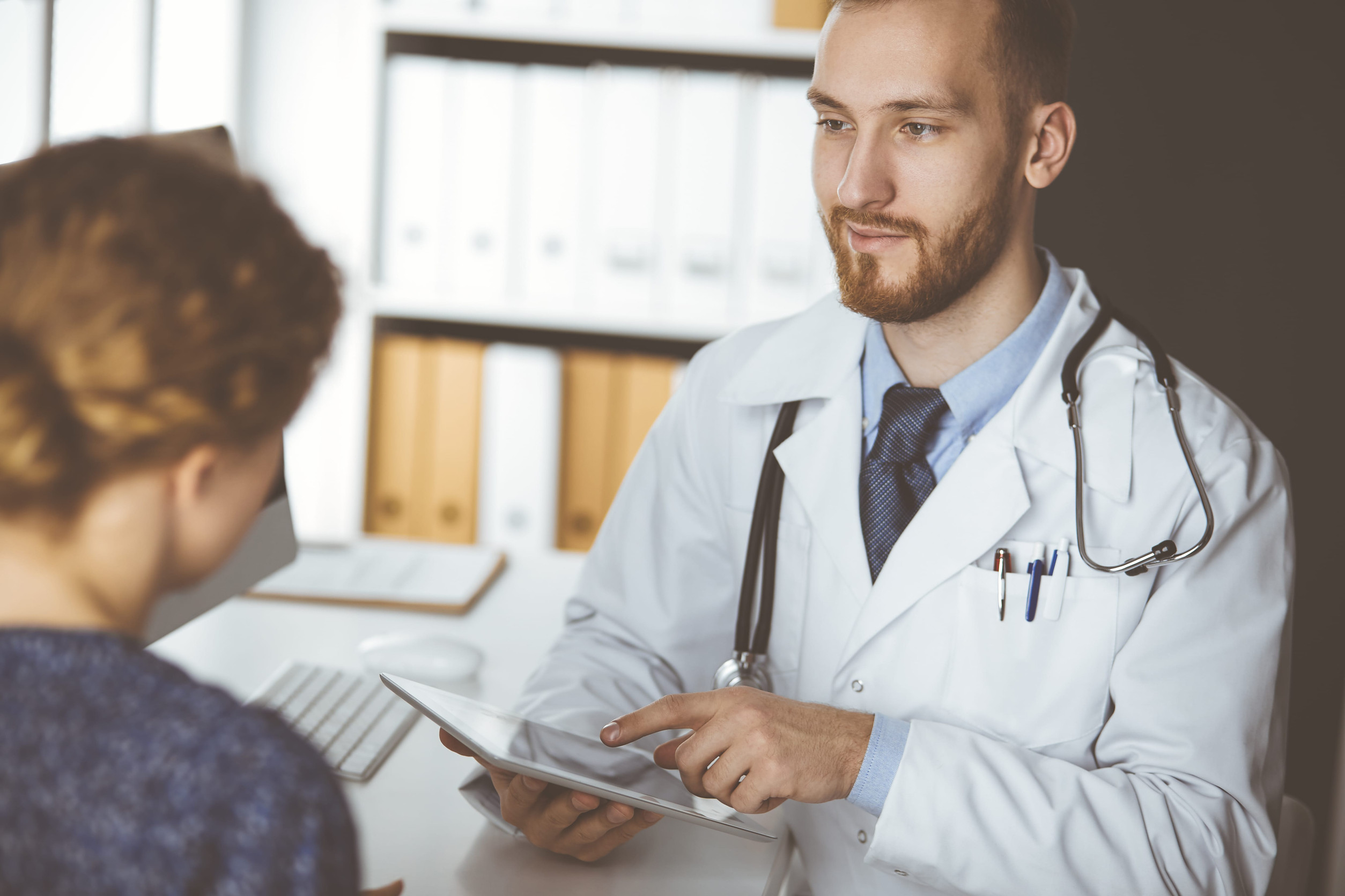 Doctor consulting patient about bronchitis treatment