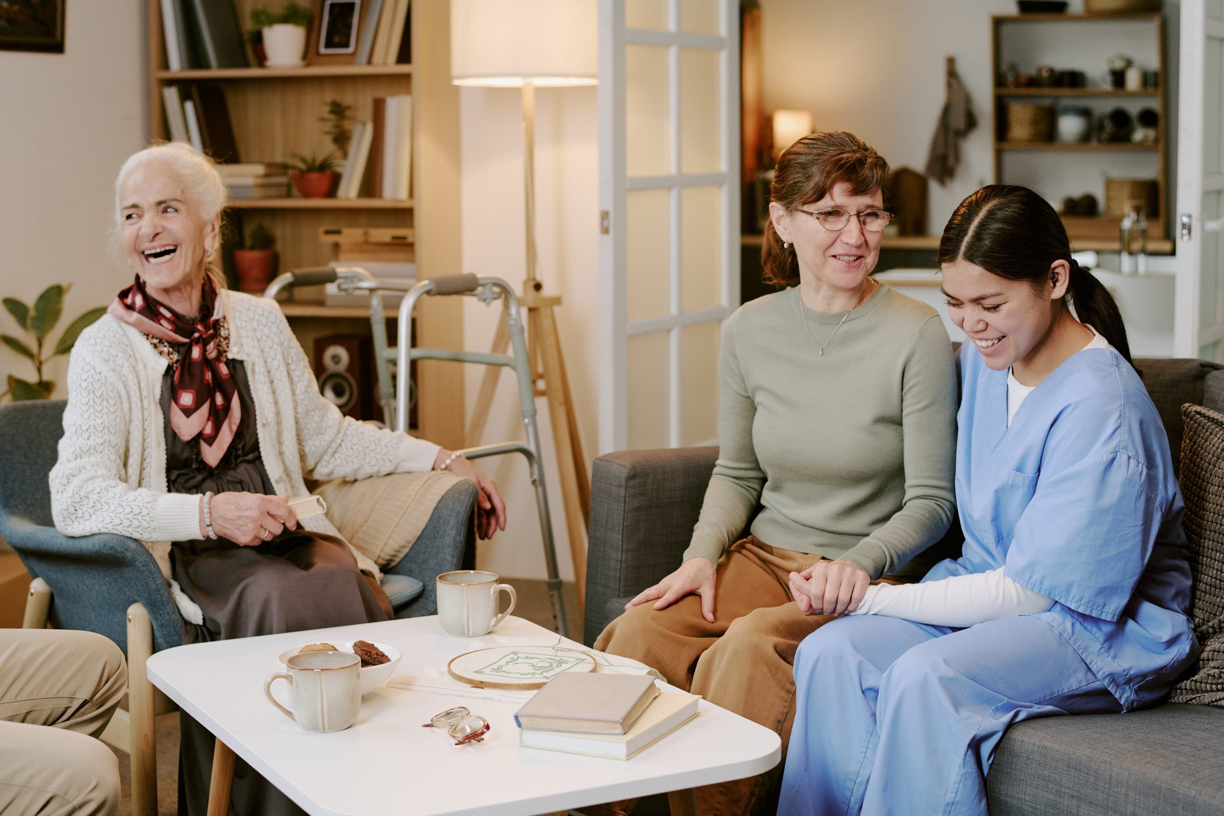 Family celebrating with home caregiver